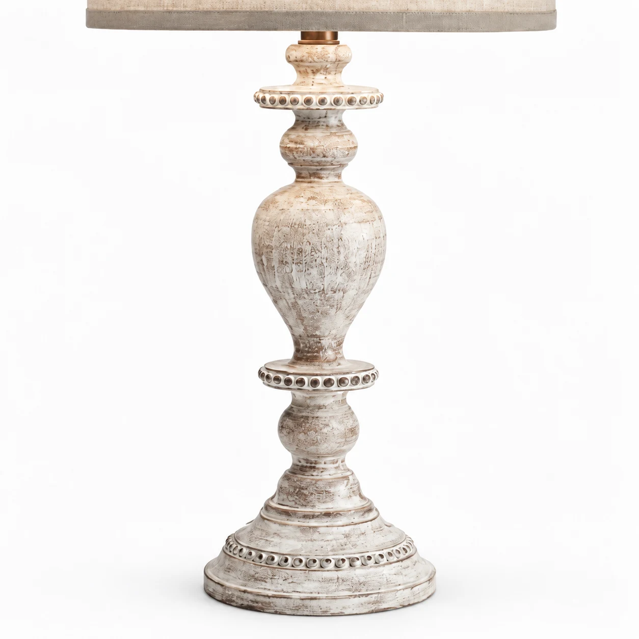 Central urn-shaped carved wood body and distressed patina detail