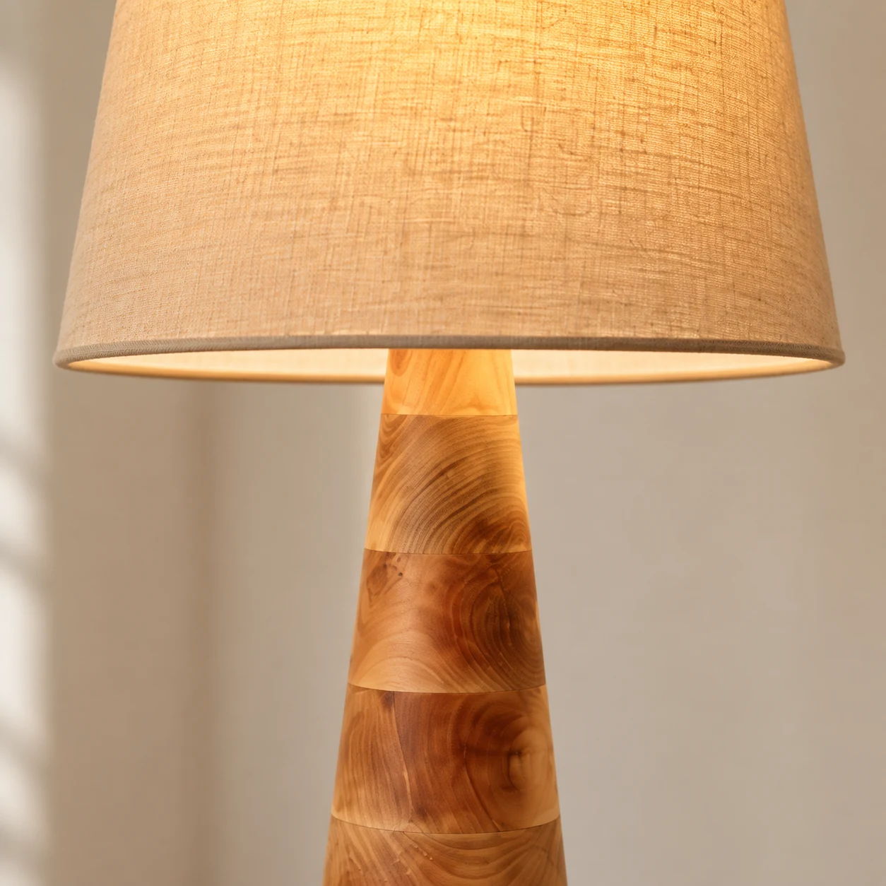 Close view of the linen shade and wood connection