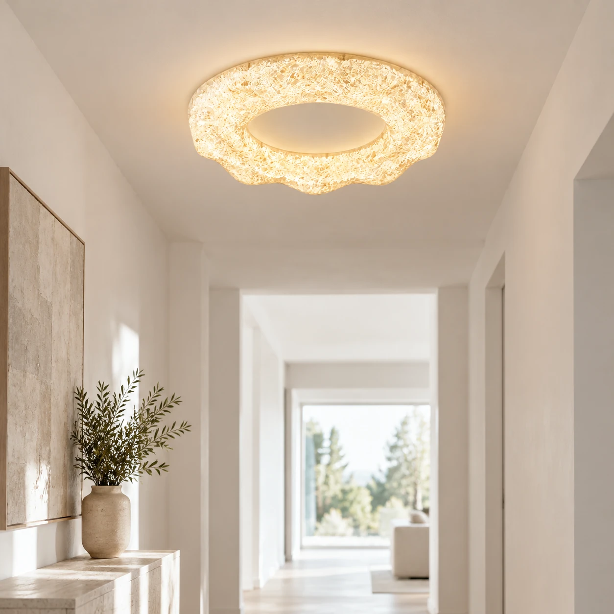 Clara sand white sculpted resin flush mount ceiling light in a hallway