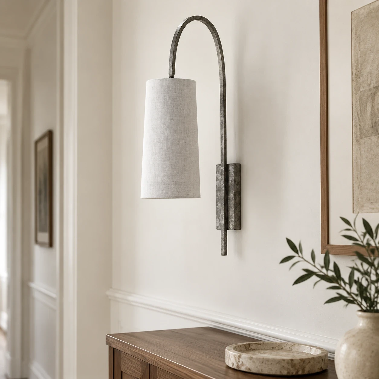 Antique Silver fabric wall sconce in a hallway