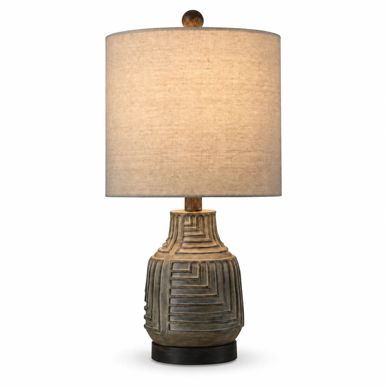 Carved wood table lamp on a white background