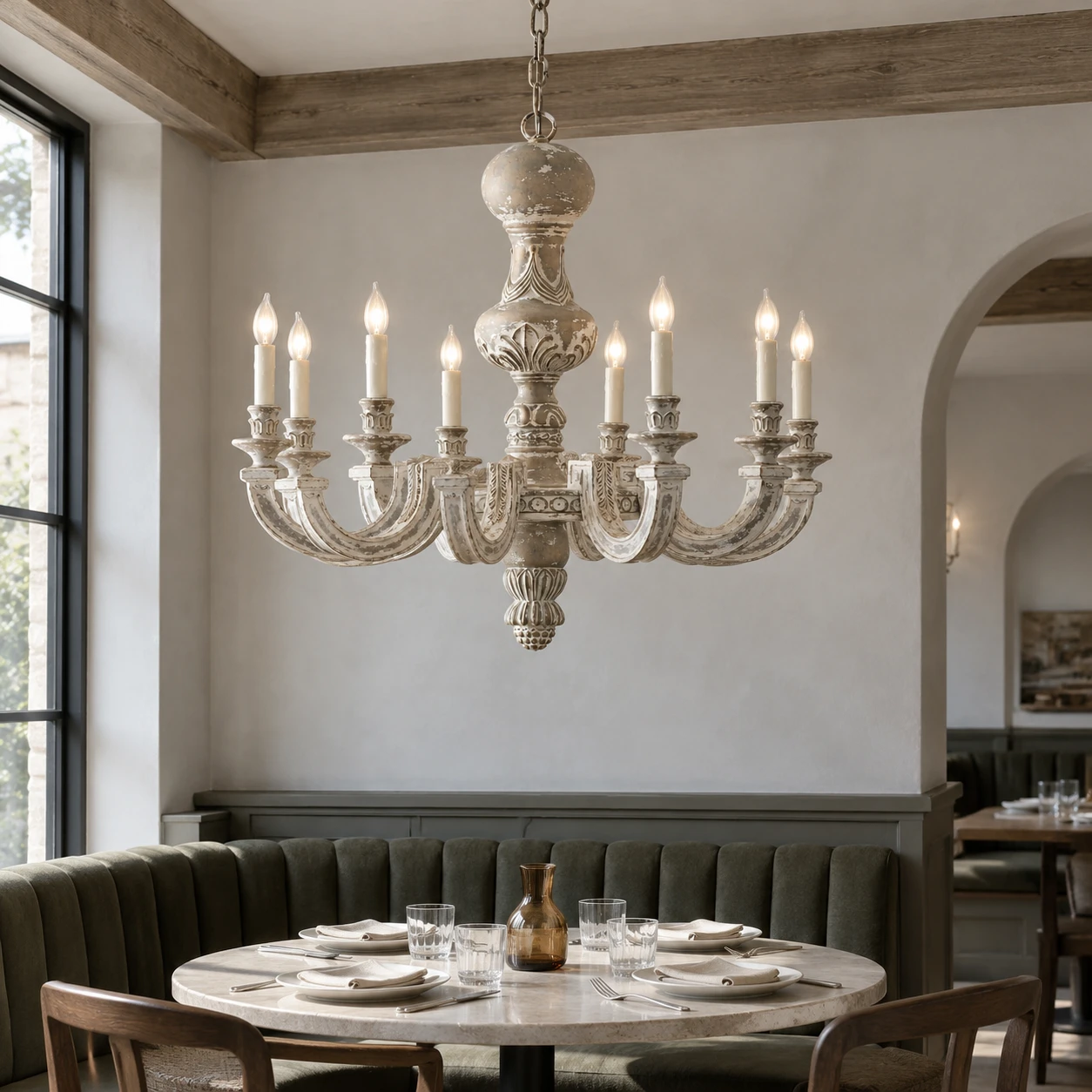 Eight-light distressed wood chandelier in a hospitality dining salon