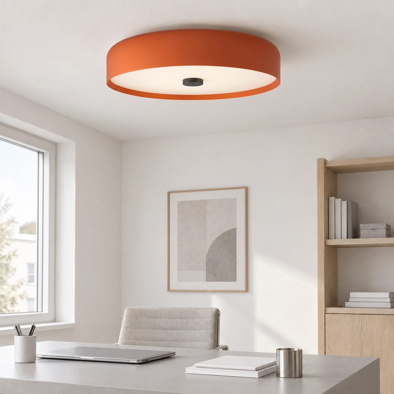 One orange Seren ceiling light in a neutral home office