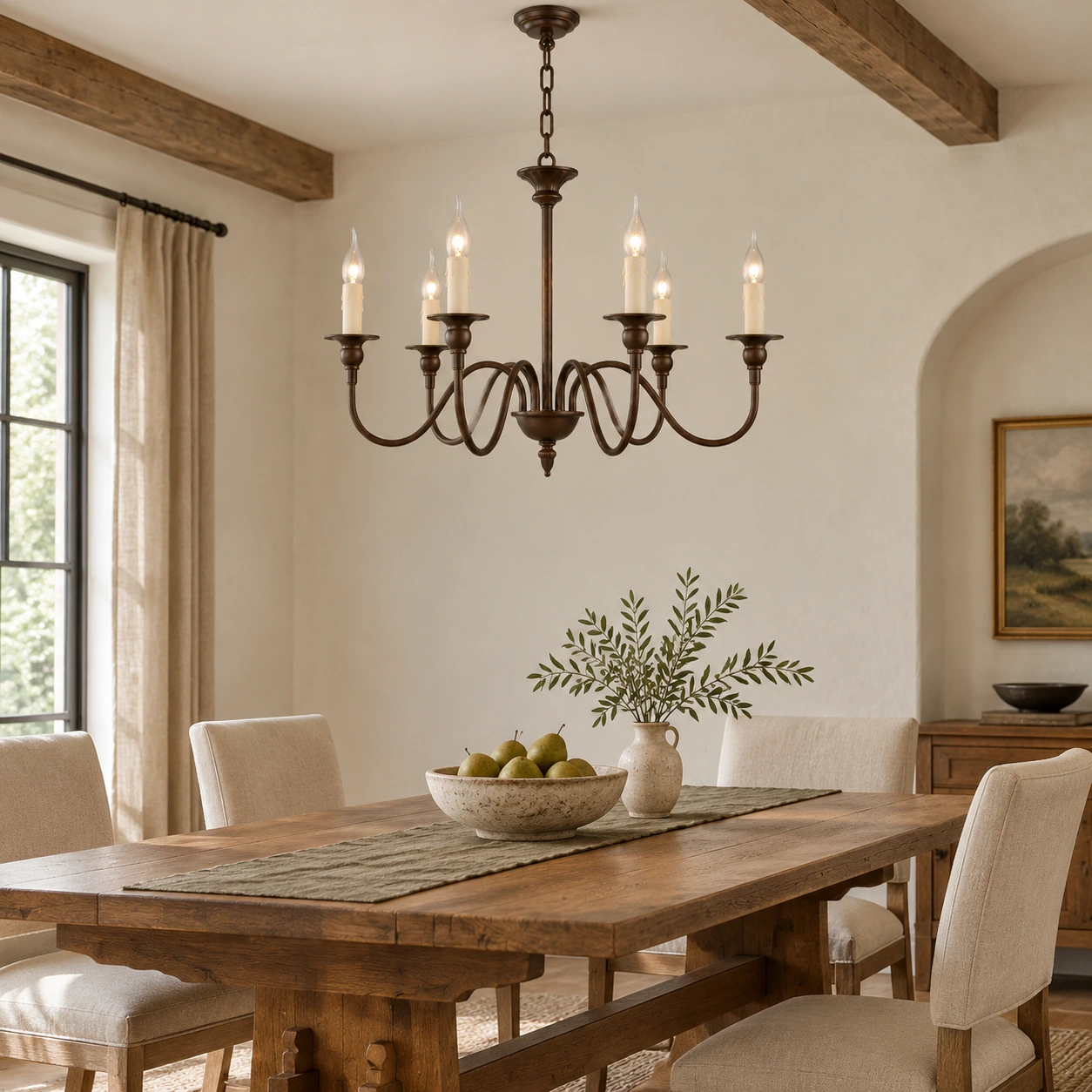 Six-light iron chandelier above an oak dining table