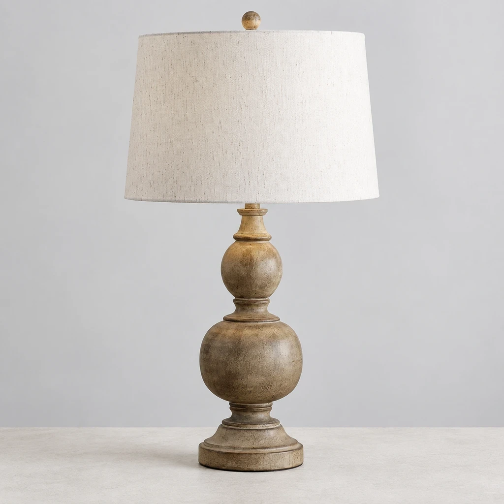 French Rustic Distressed Wood Table Lamp switched off in a neutral studio