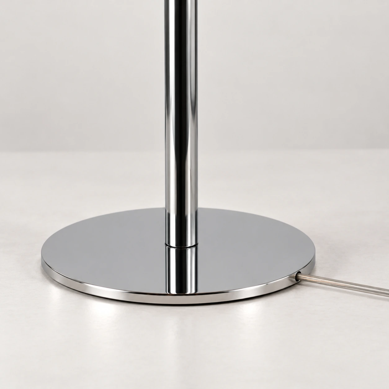 Round chrome base with side cable exit