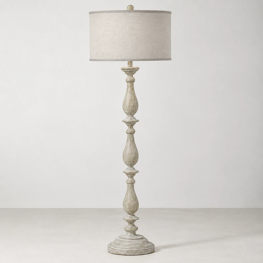 French Rustic Carved Wood Floor Lamp switched off in a neutral studio