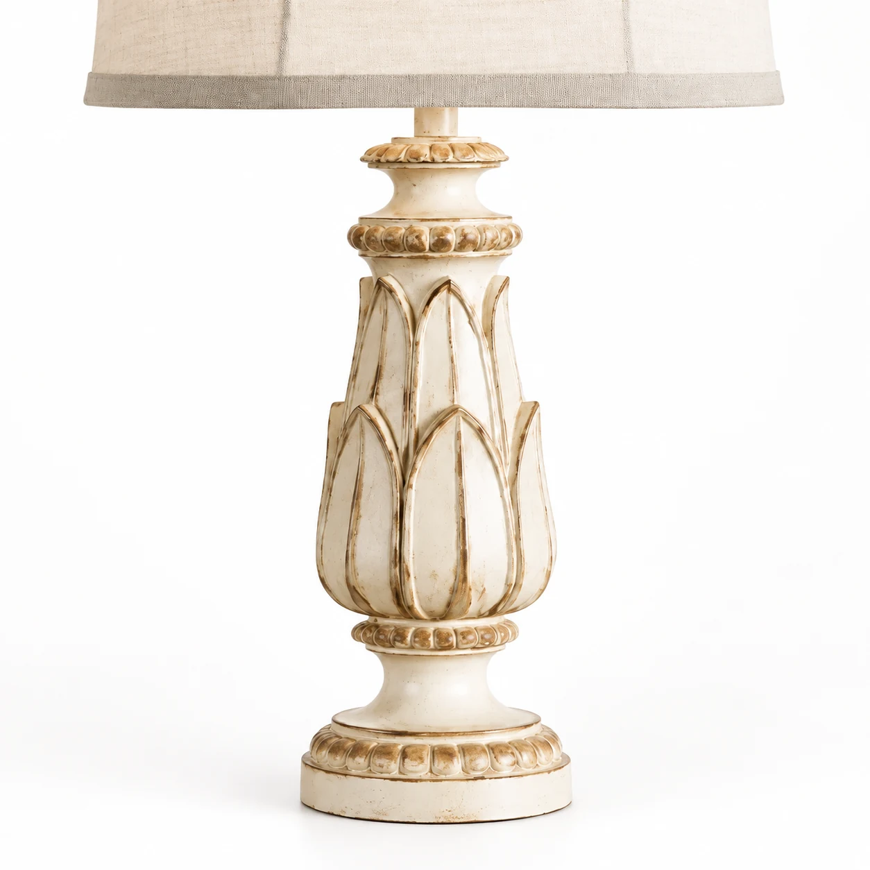 Close detail of the carved floral body and rounded pedestal base