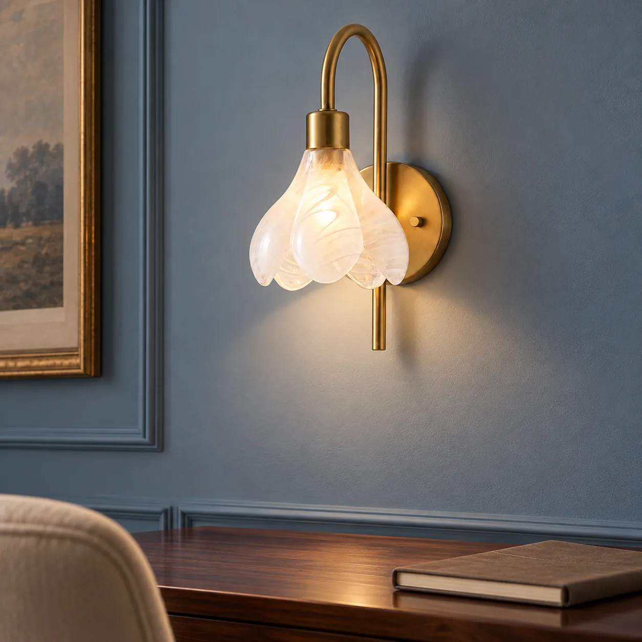 Wall sconce above a desk