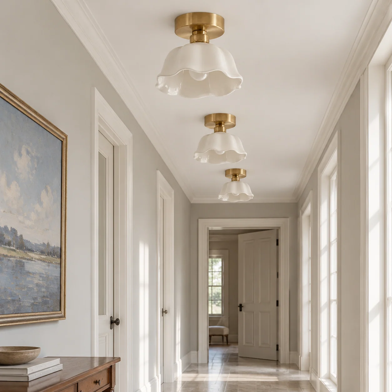 Three matching ceramic flower flush mounts along a dry corridor