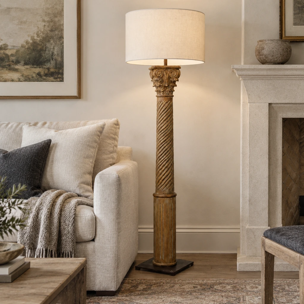 Alden carved wood floor lamp beside a pale linen sofa
