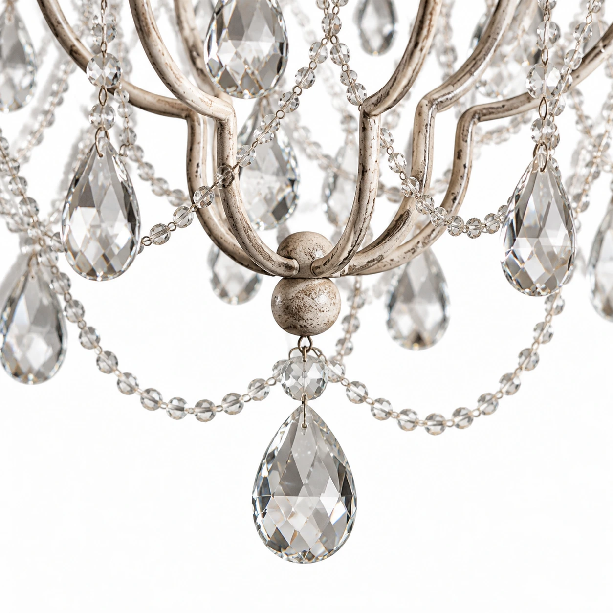 Close detail of faceted crystal beads and teardrop pendants