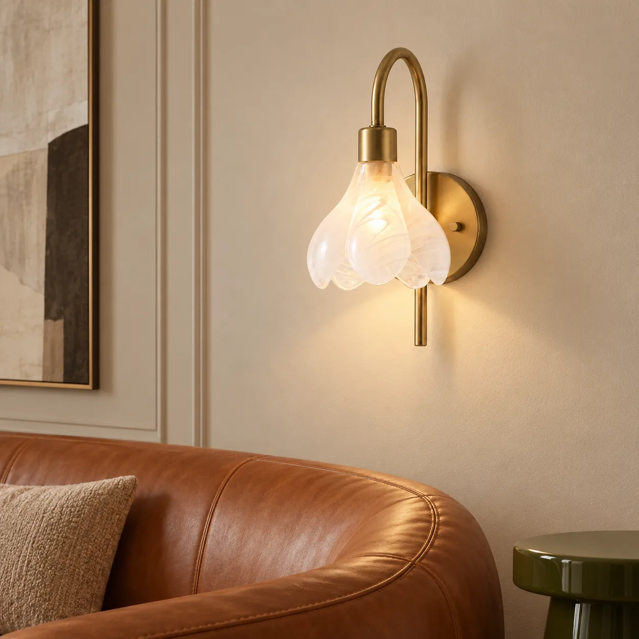 Wall sconce beside a leather sofa