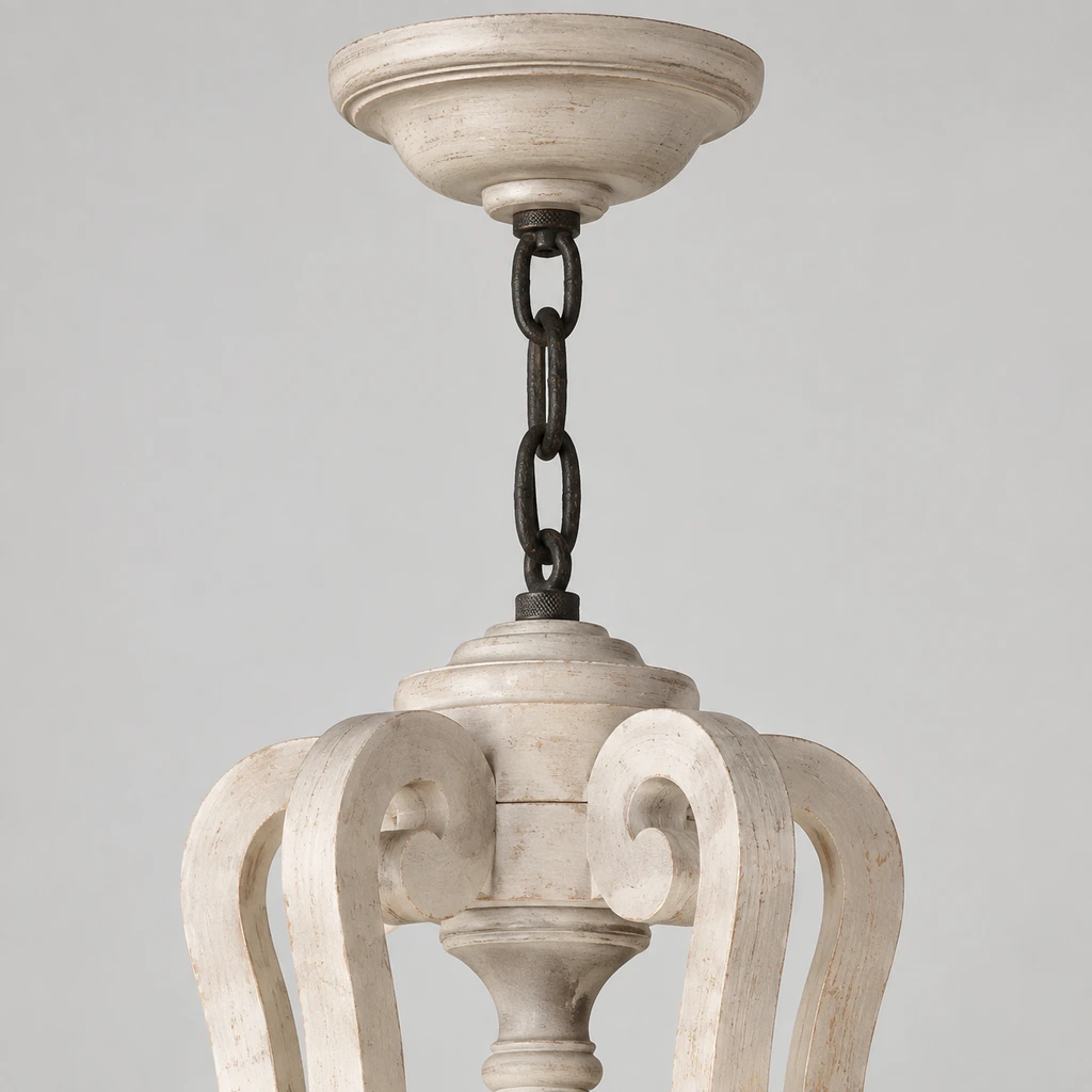 Close detail of the dark chain and ceiling canopy connection