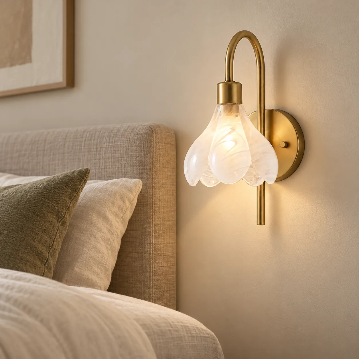 Wall sconce above a bed