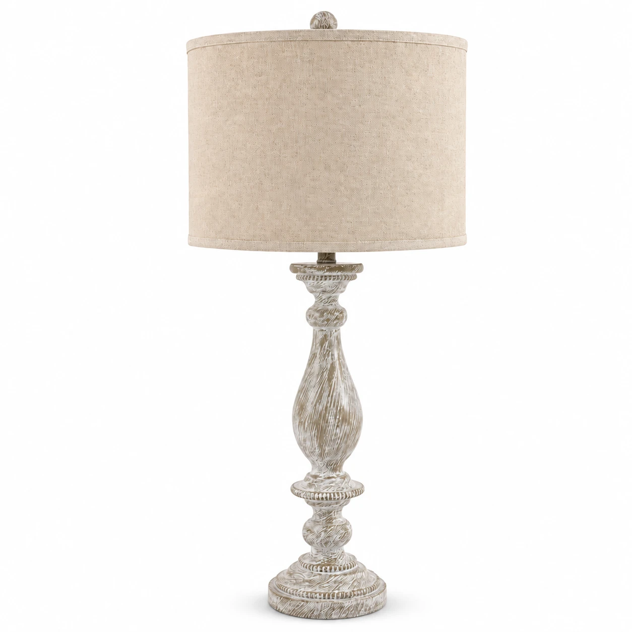 Camille French-country carved wood table lamp with beige fabric shade on white background