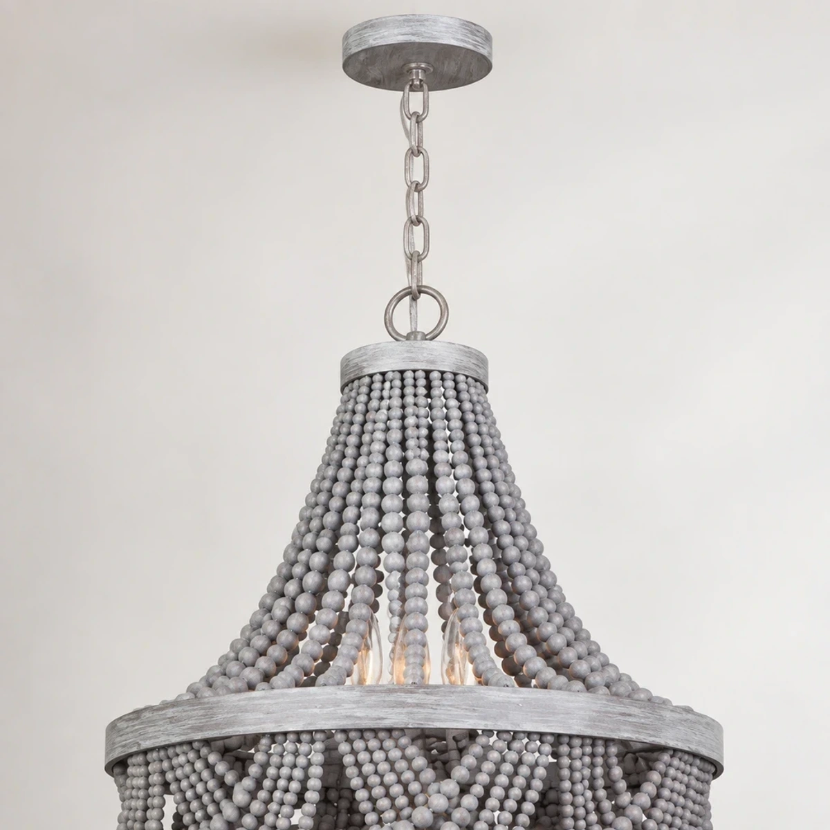 Round ceiling canopy, short chain and gray bead crown detail