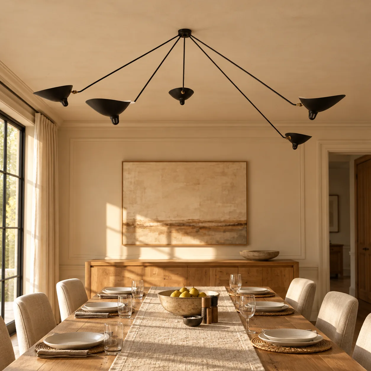 Black 5-arm ceiling light above a dining table