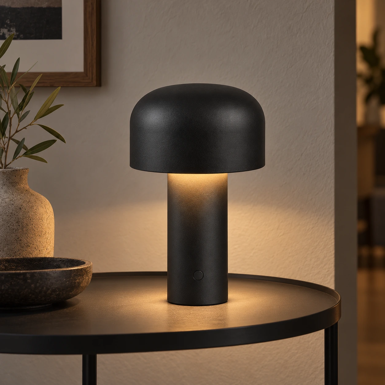 Matte black table lamp on a lounge side table in the evening