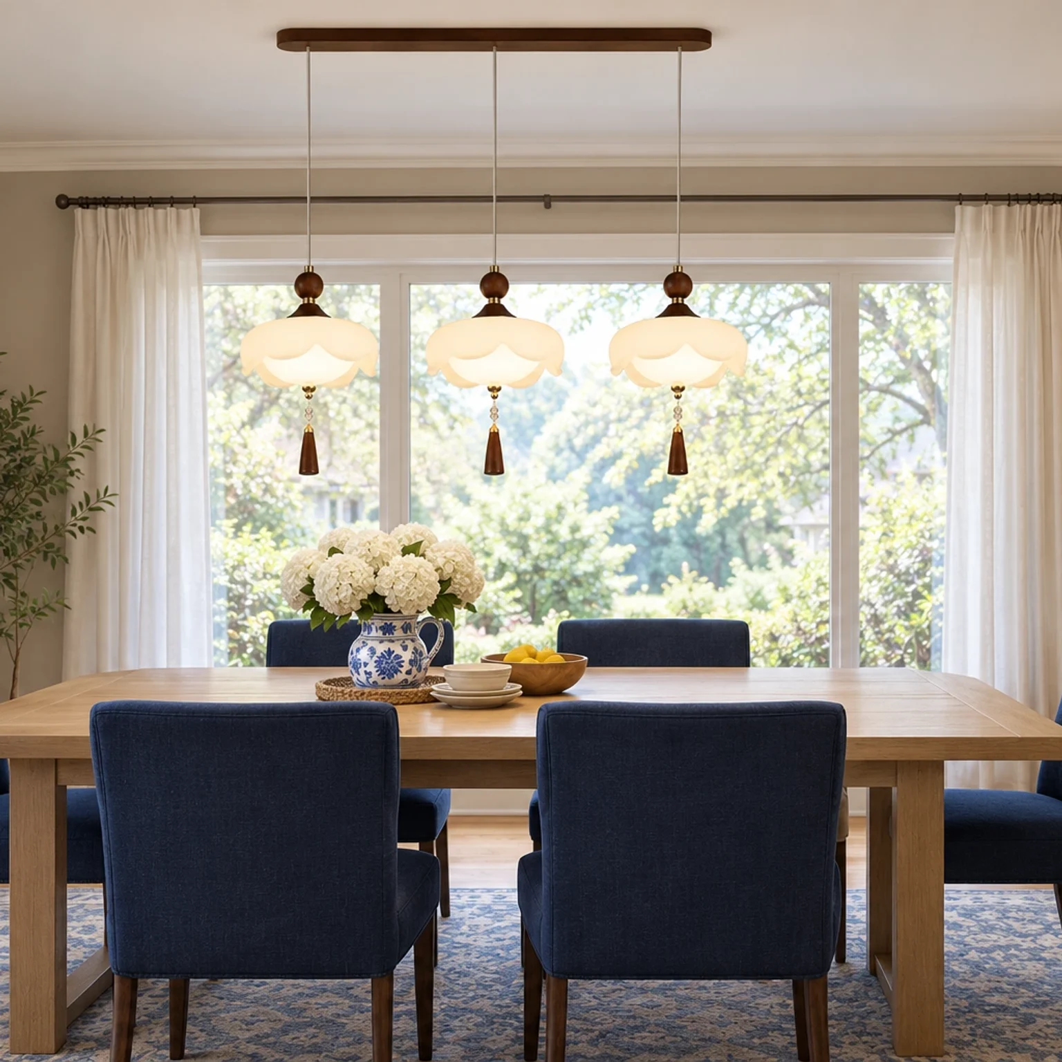Mara linear pendant chandelier in a greige dining room
