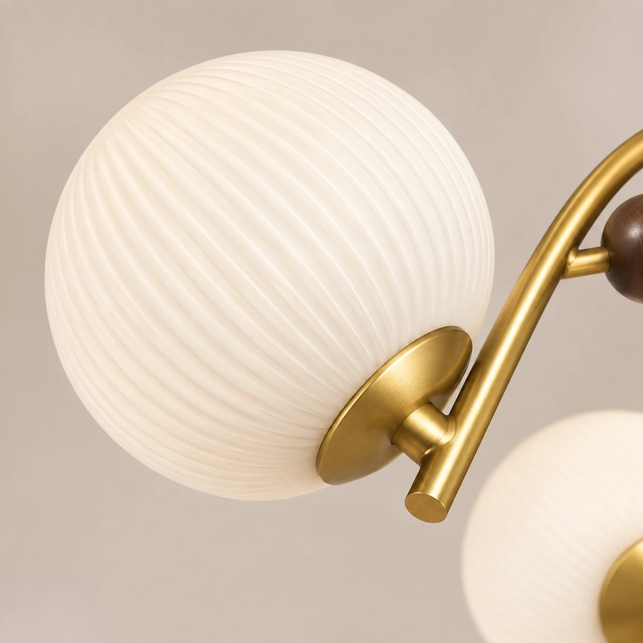 Ribbed milky glass globe and iron branch joint
