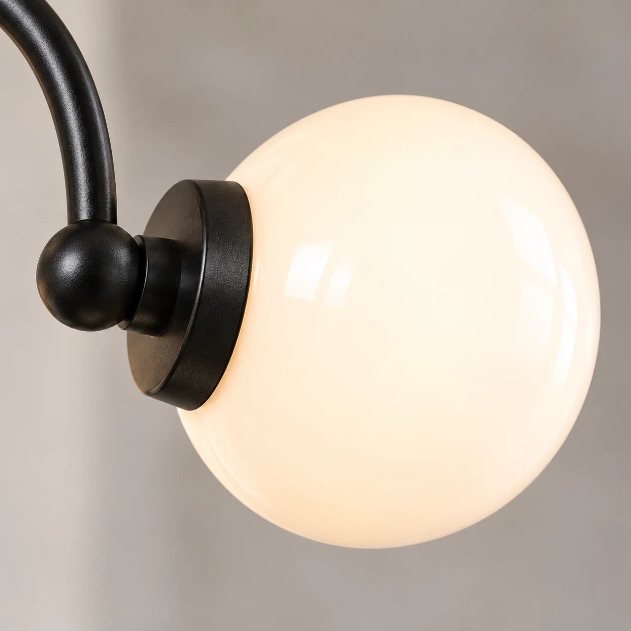 Opal glass globe and black cup socket detail