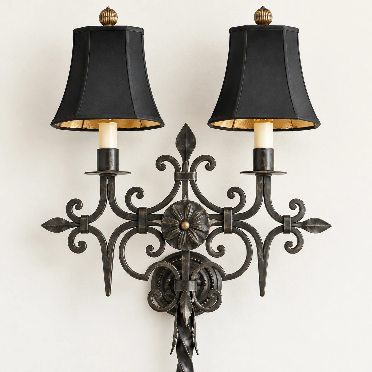 Central flower medallion and symmetrical iron scrollwork