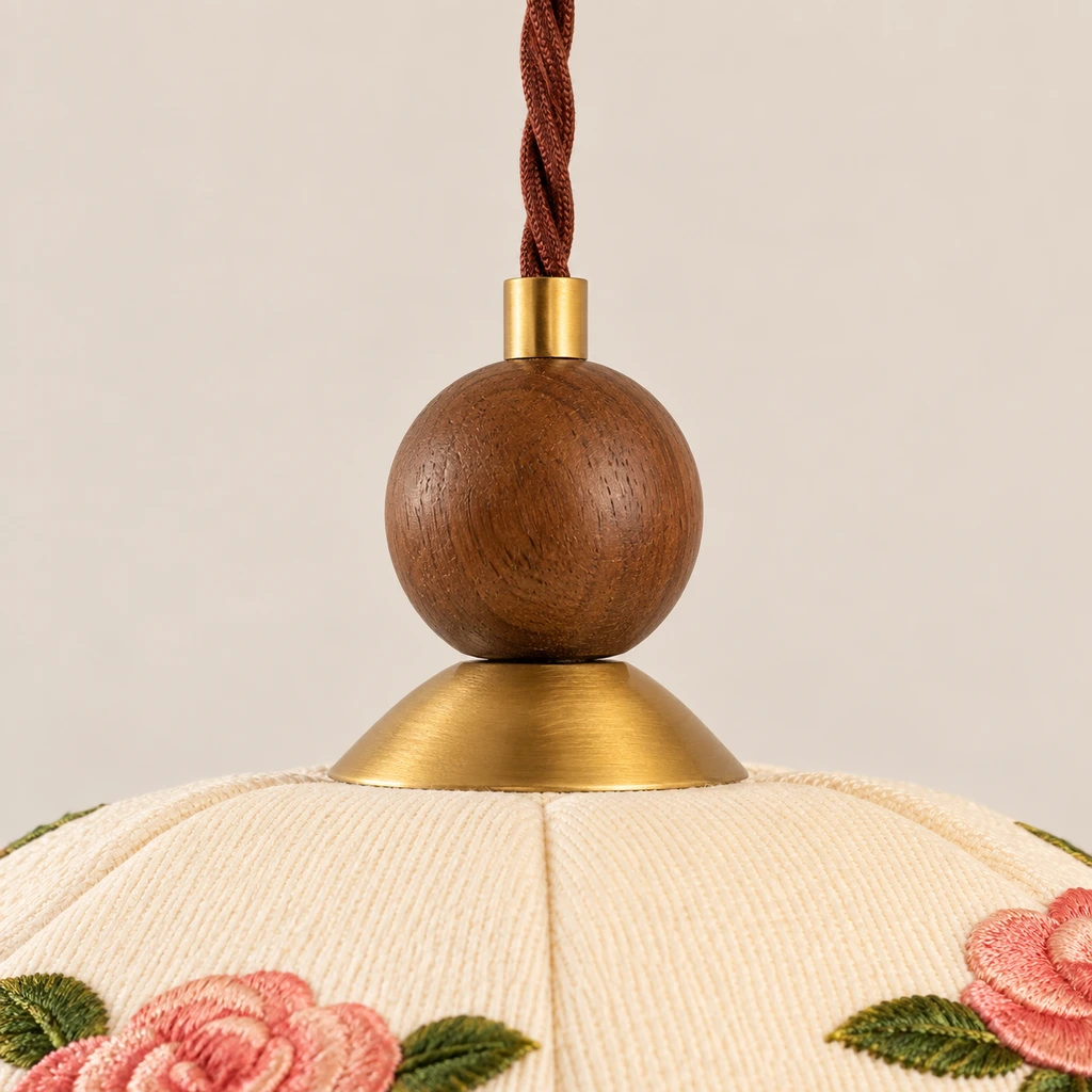 Close detail of the solid wood finial and cord