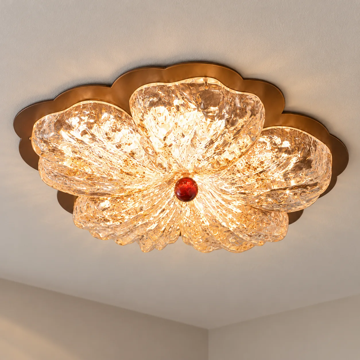 Coffee floral resin flush mount centered on a pale ceiling