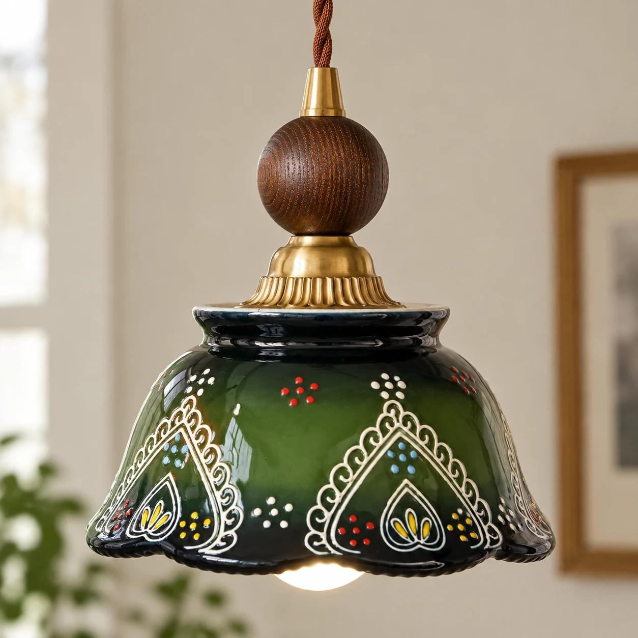 Green relief-painted ceramic shade and scalloped rim