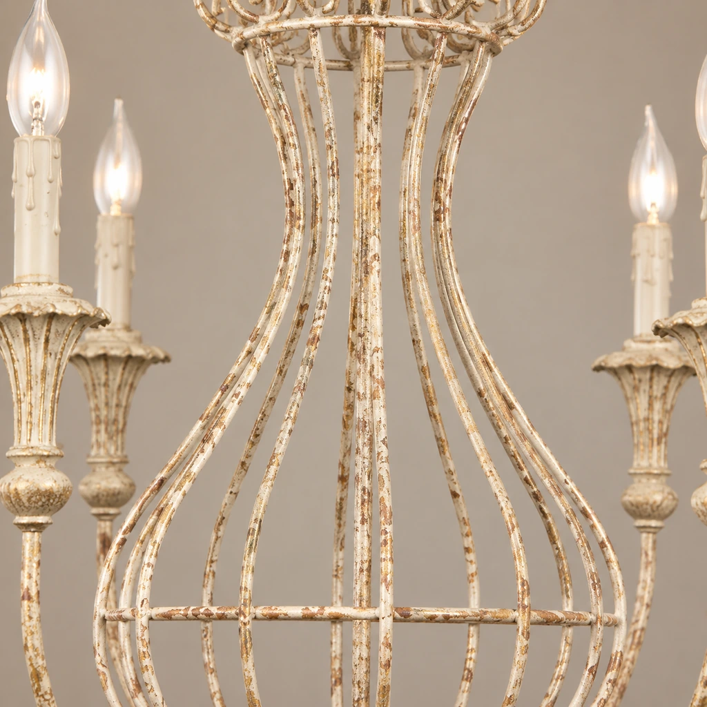 Close detail of distressed iron scrollwork and cage ribs