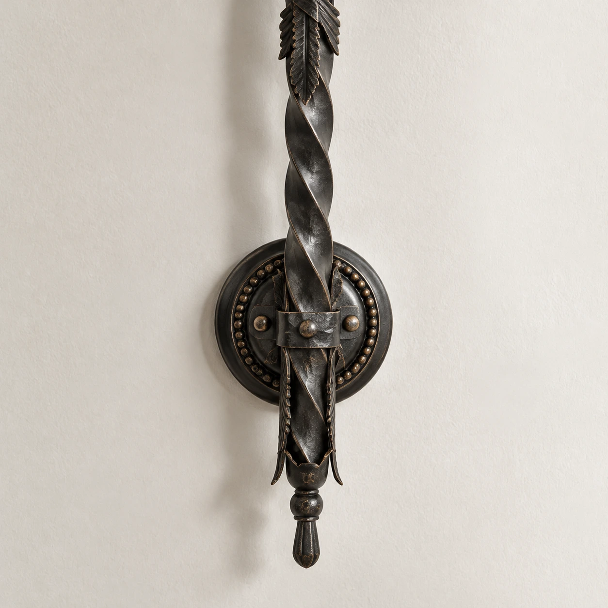 Twisted lower iron stem and circular wall mount