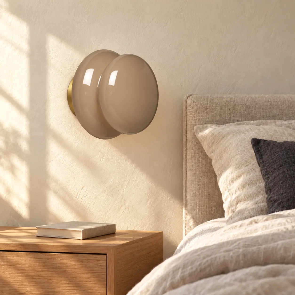 Gray wall light in a bedroom