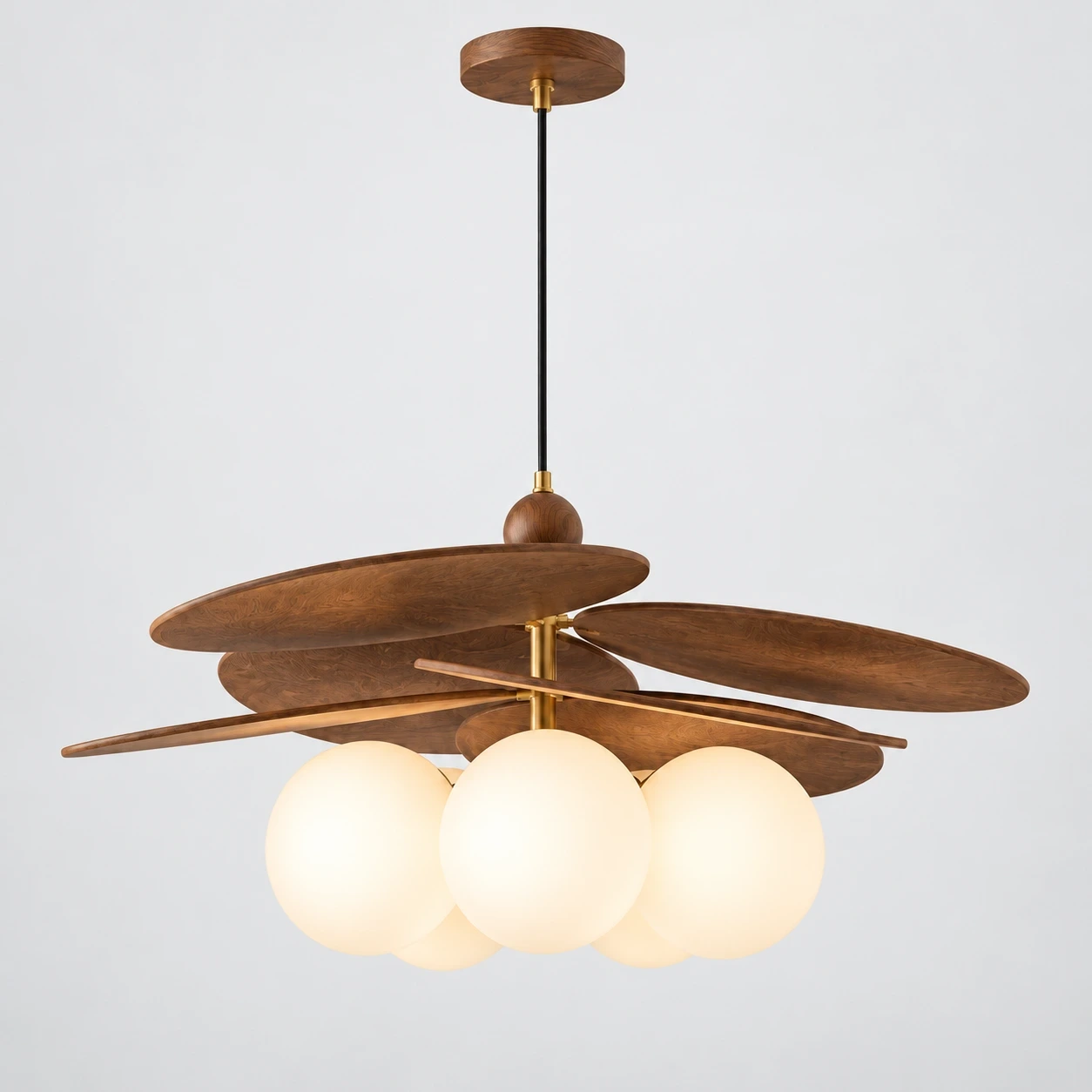 Wushlp Vintage Bean Glass and Metal Pendant Light switched on in a neutral studio