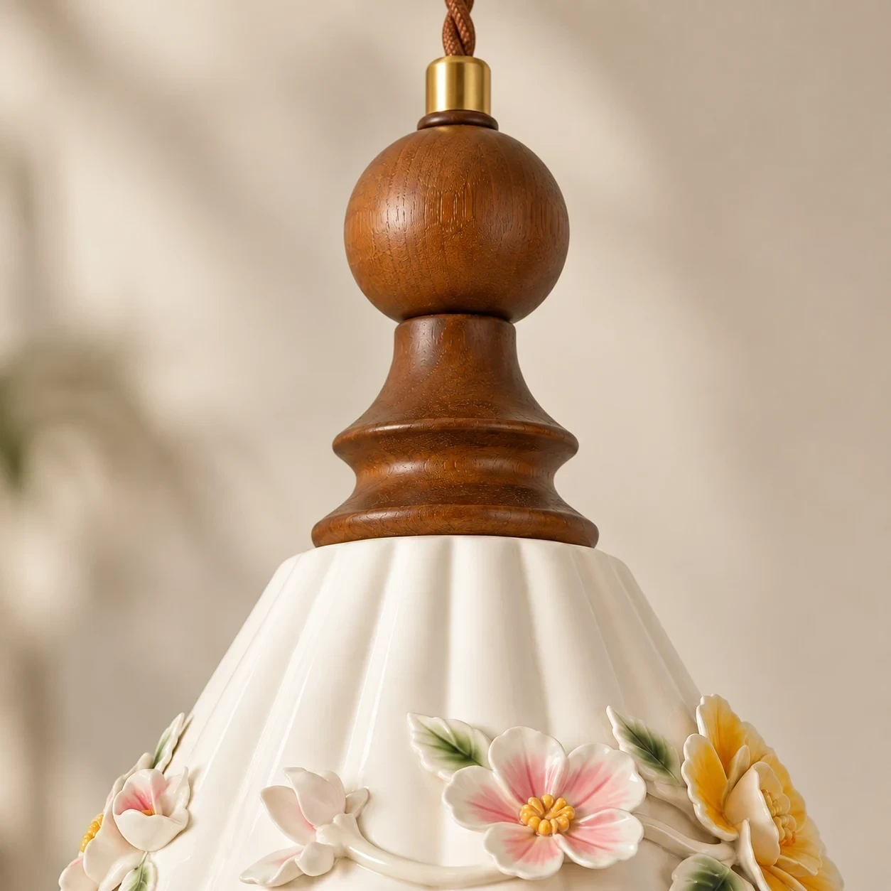Close view of Vintage Floral Ceramic and Wood Pendant Light braided suspension cable