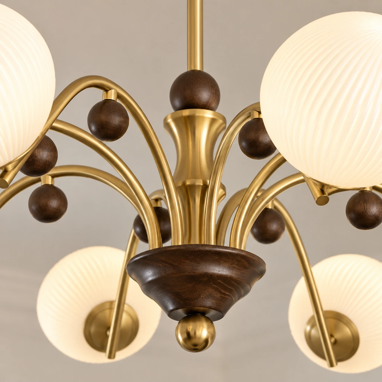 Gold-tone iron hub and dark wood-like center accents