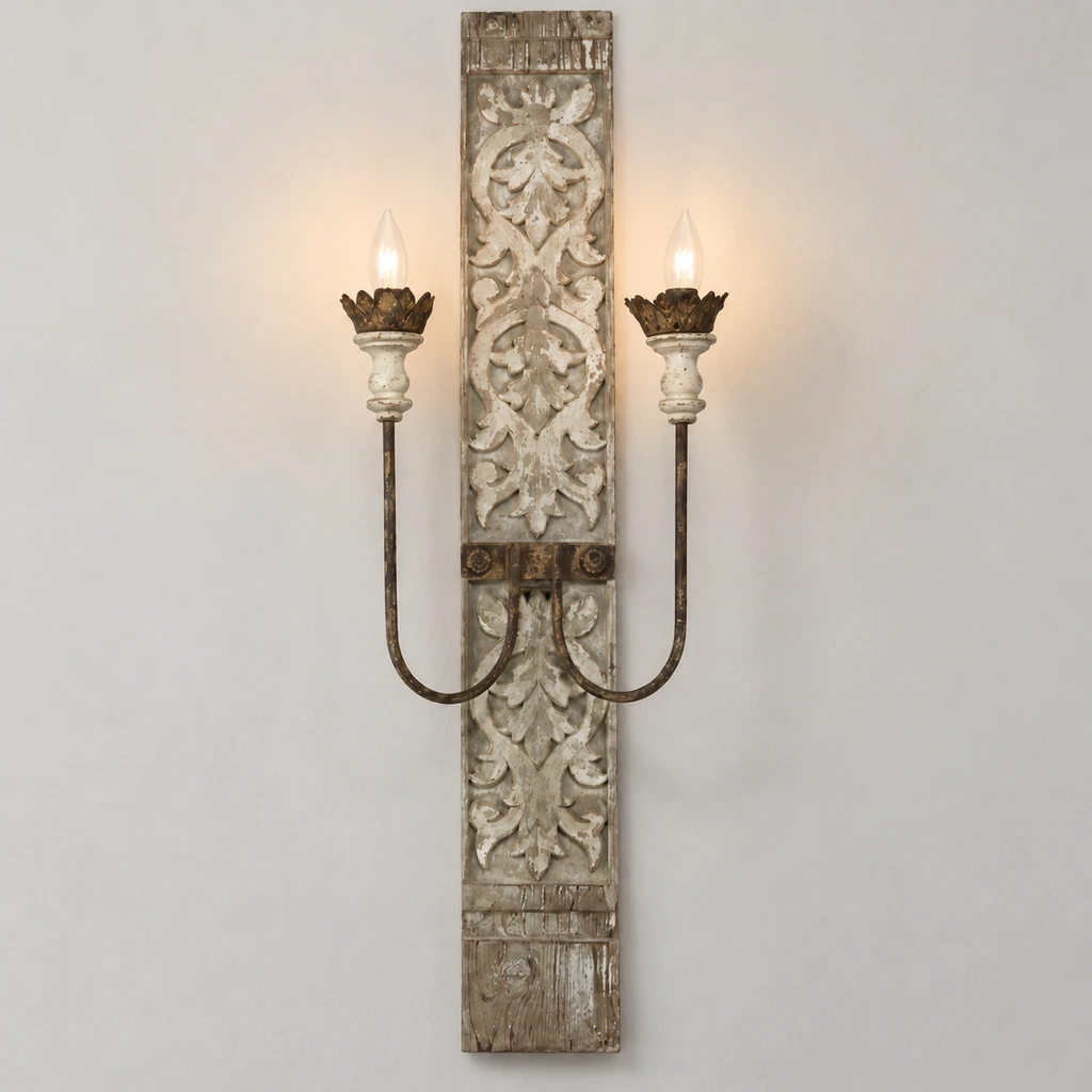 Marielle carved wood wall sconce illuminated in a neutral studio