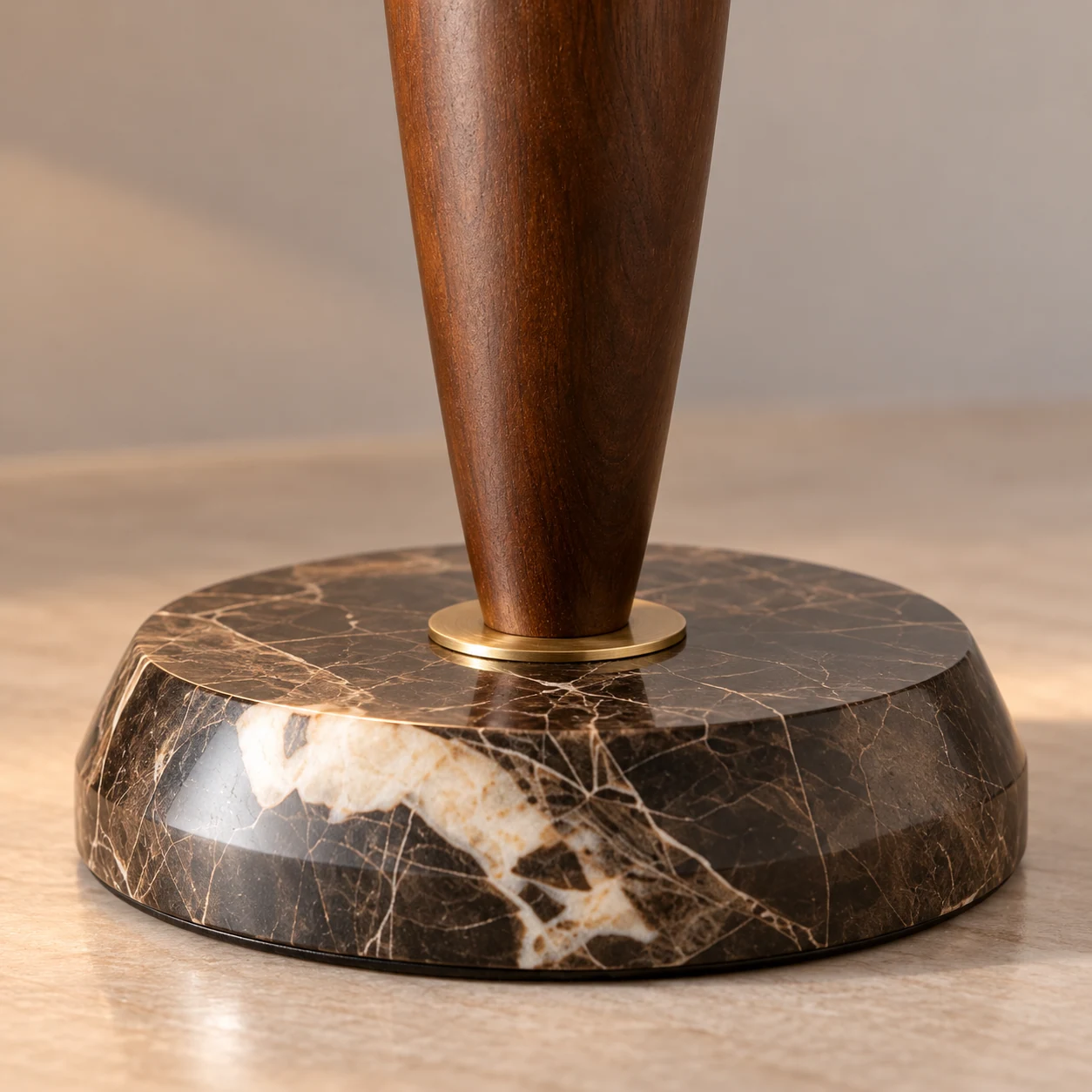 Close view of the round dark veined stone base