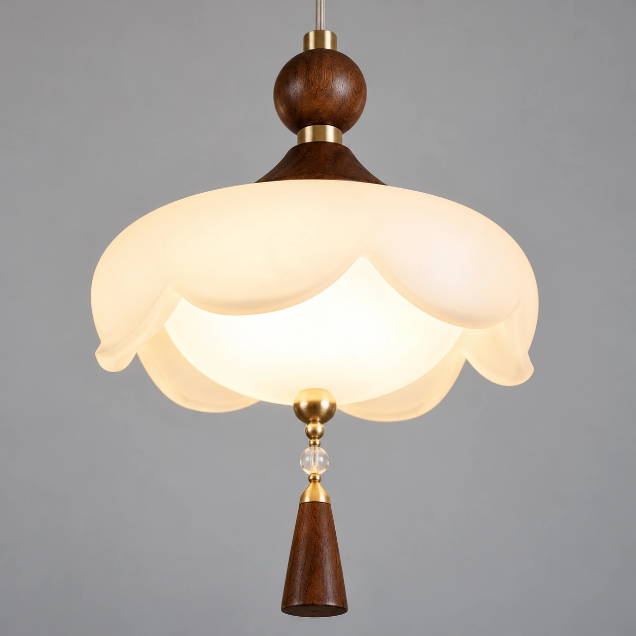Close detail of a scalloped frosted glass shade