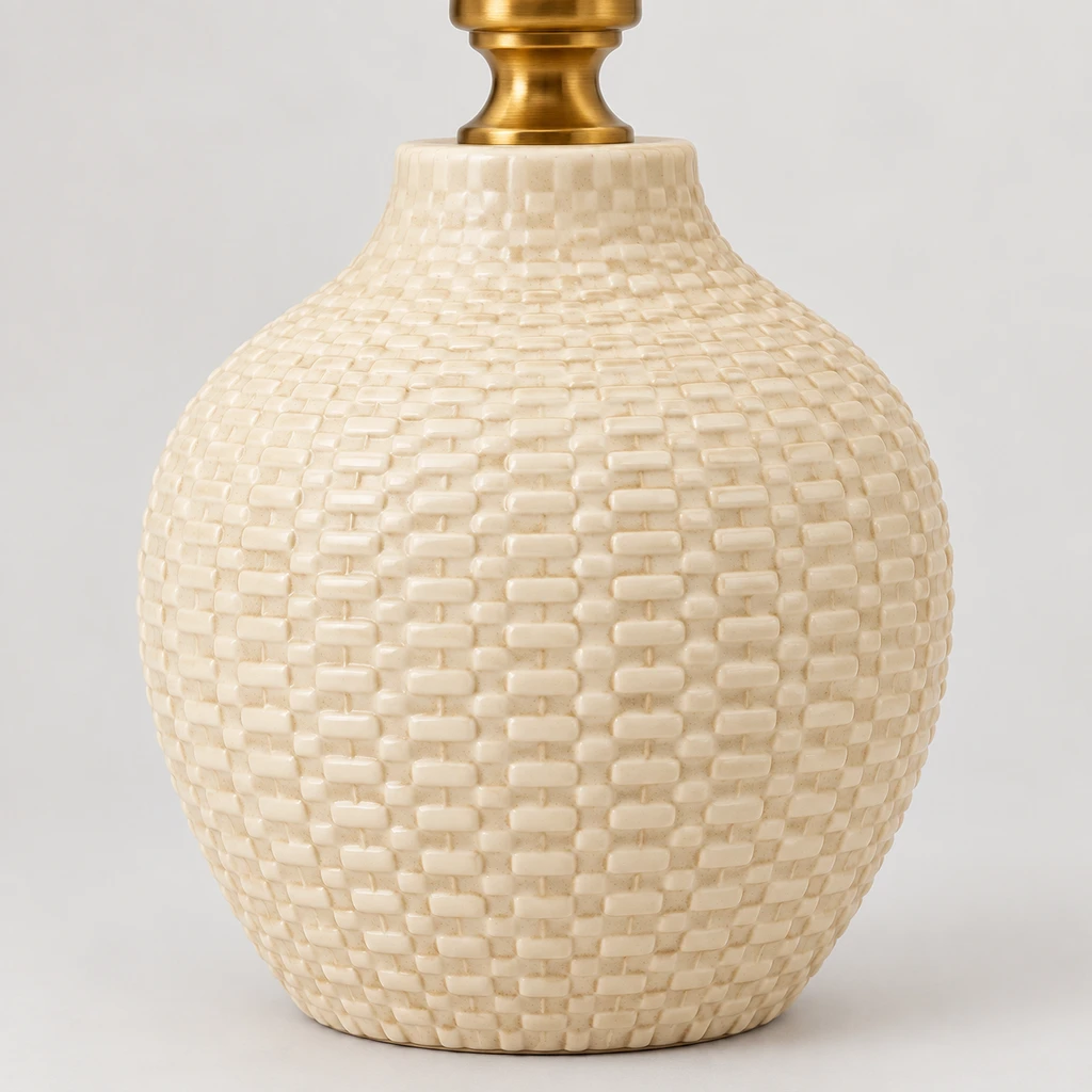 Close detail of the textured cream ceramic vessel