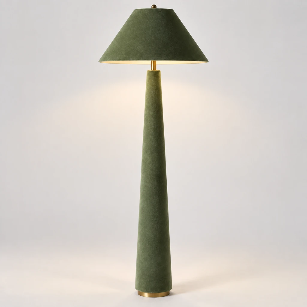 Marlowe sculptural velvet floor lamp illuminated in a neutral studio