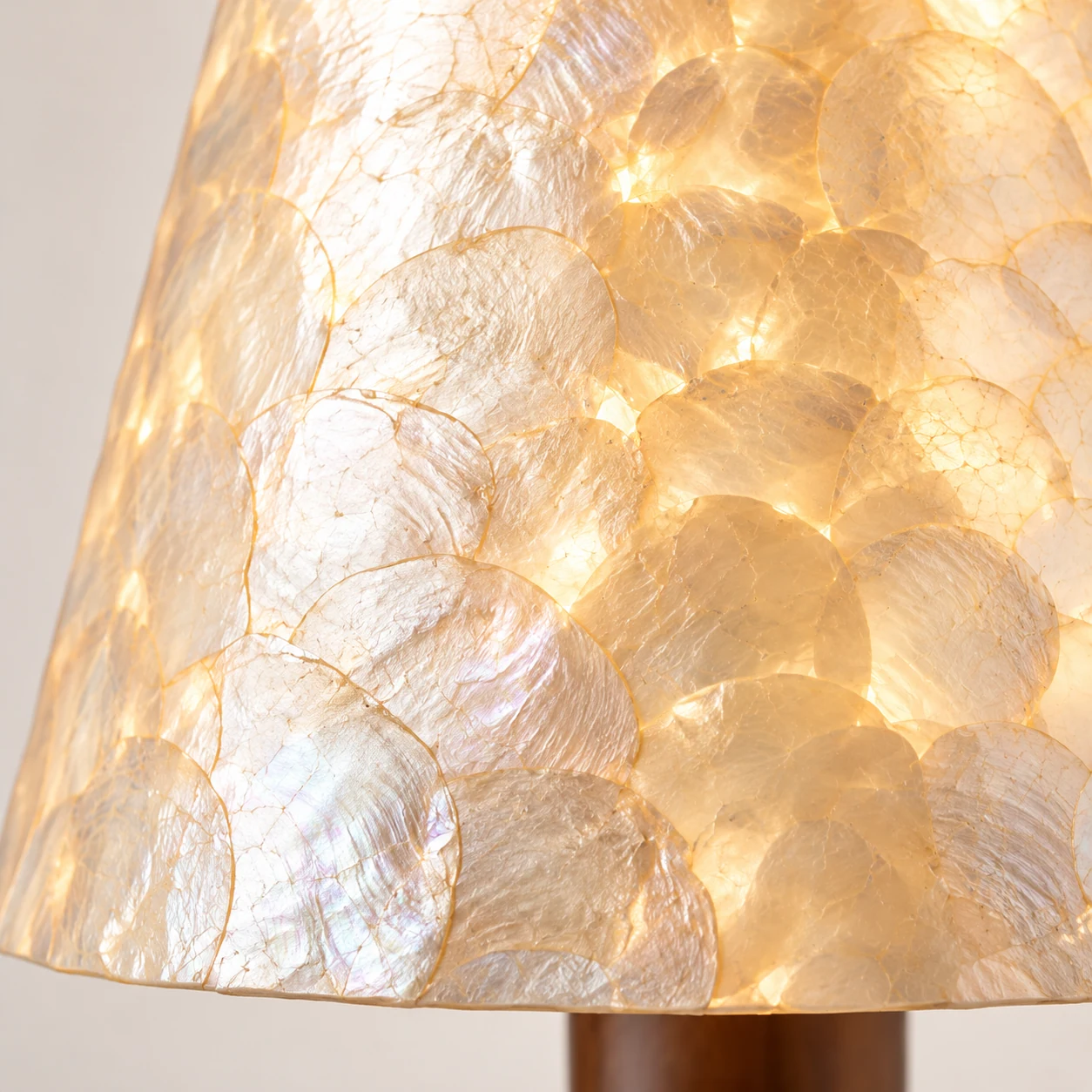 Close view of the translucent ivory shell-mosaic shade
