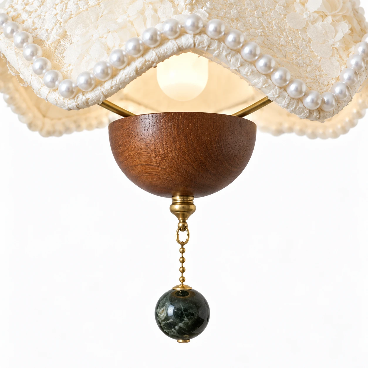 Walnut cup, bead finial and pearl rim underside