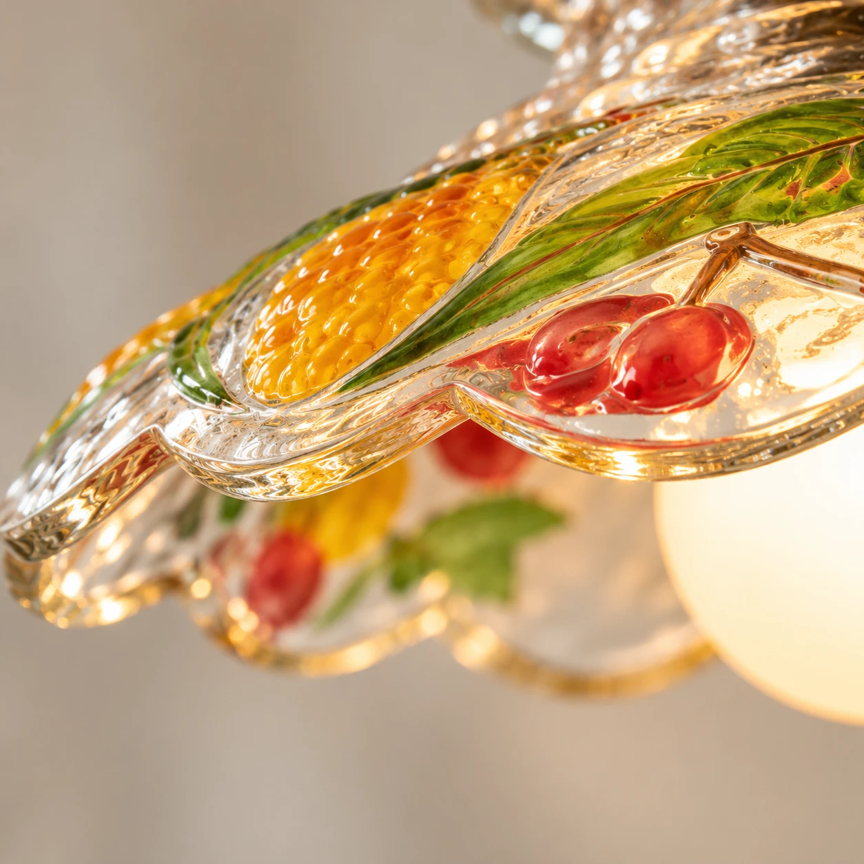 Close detail of the scalloped painted glass rim