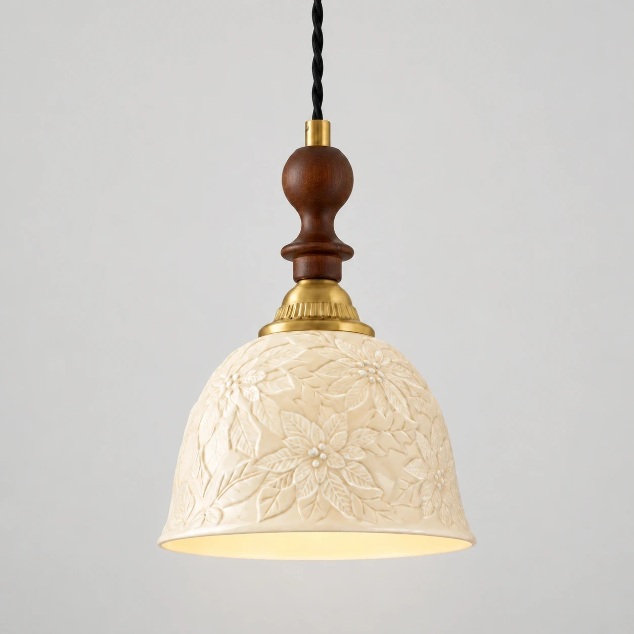 Wushlp Vintage Embossed Ceramic and Solid-Wood Pendant Light switched on in a neutral studio