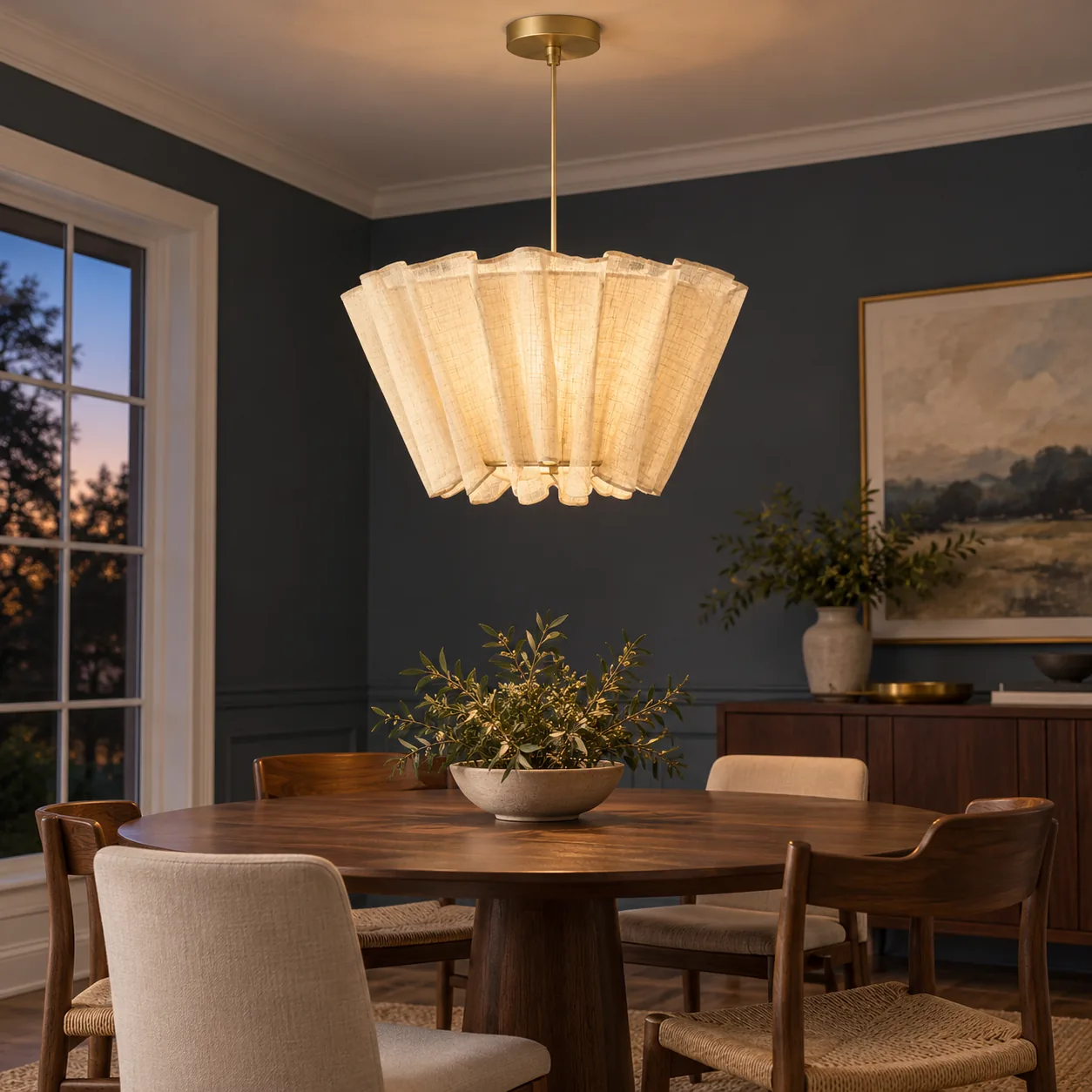 Milo pendant in a dining room with blue walls at evening