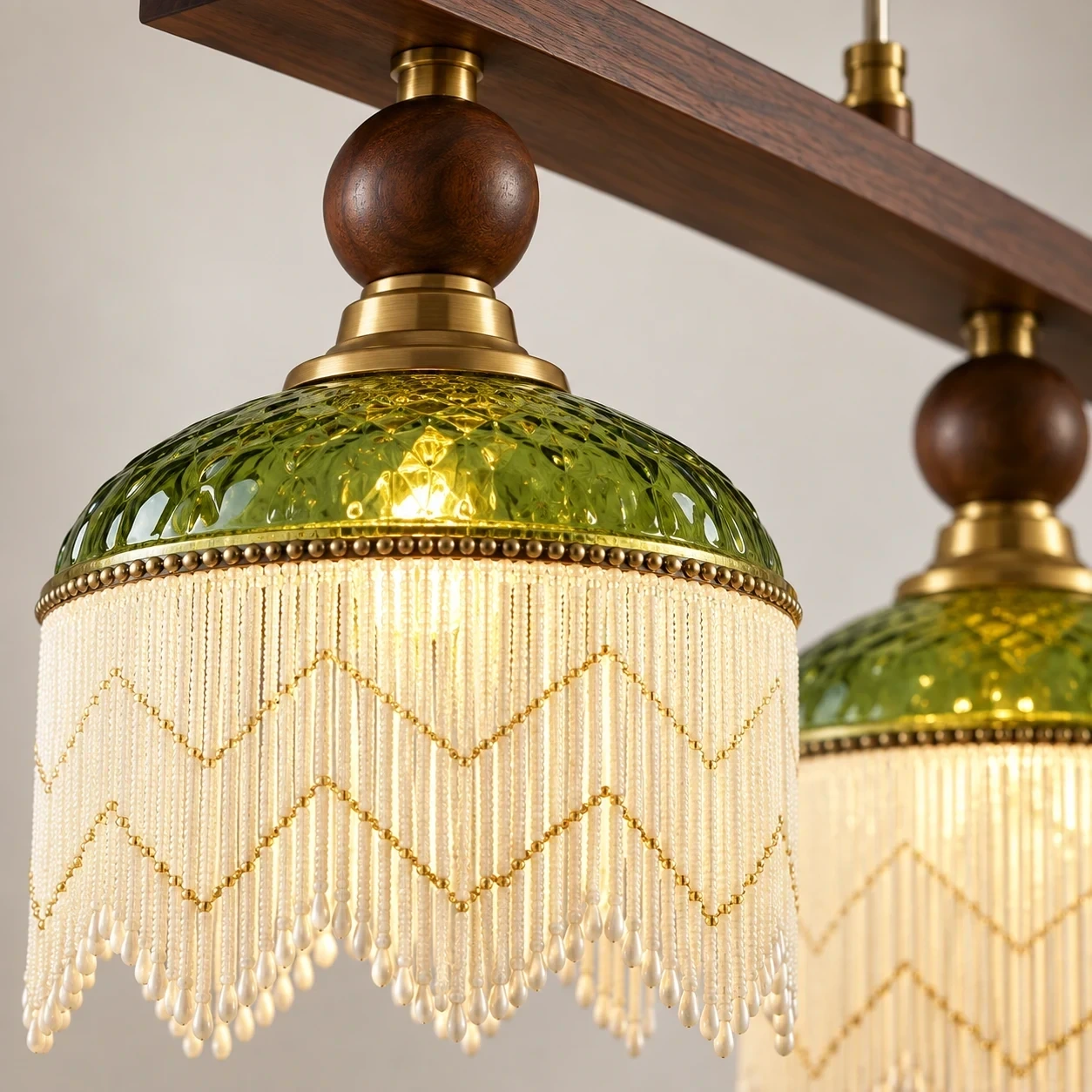 Close view of Wushlp Vintage Four-Light Green Glass Linear Pendant Light green glass shade