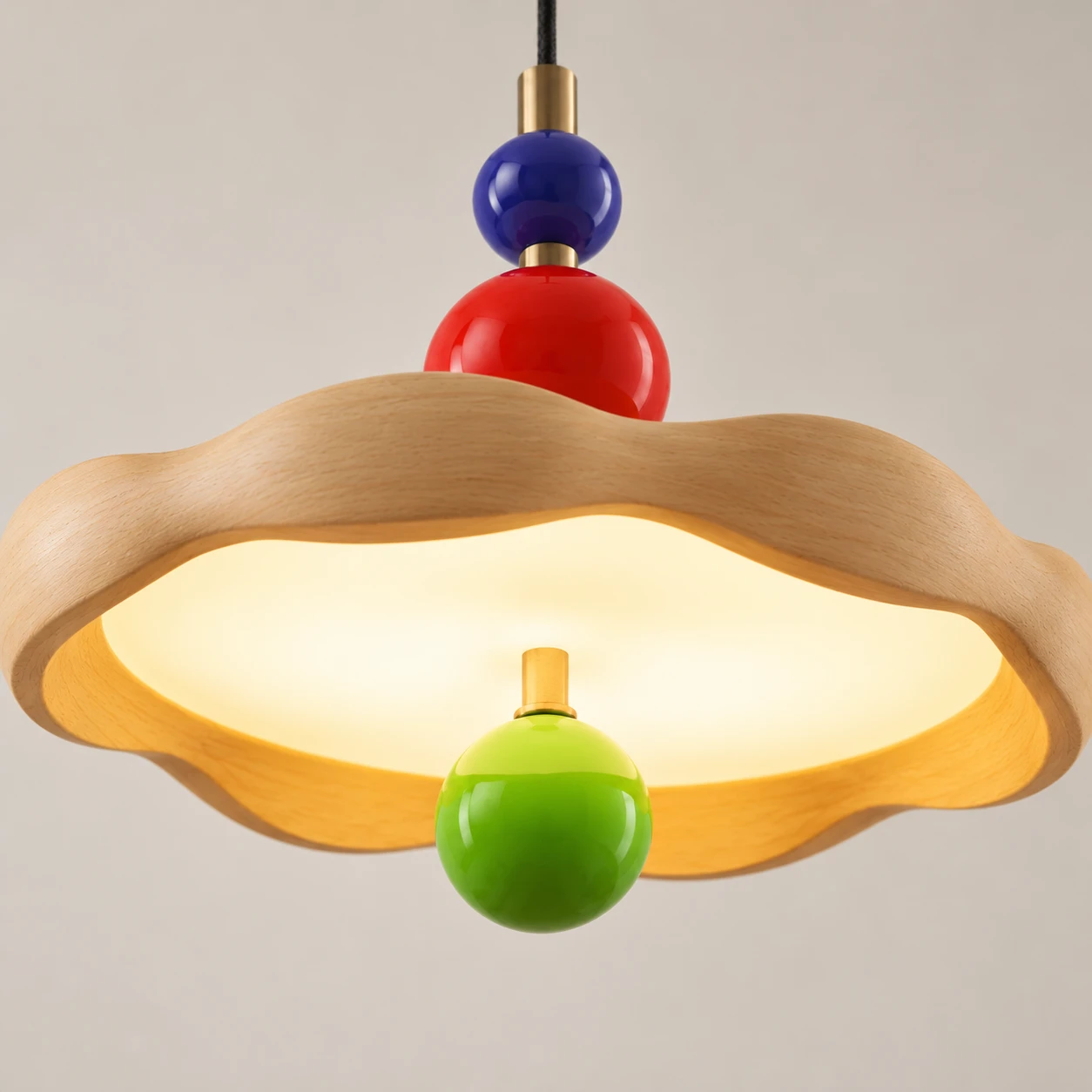 Close underside view of the wood shade glow and lime orb