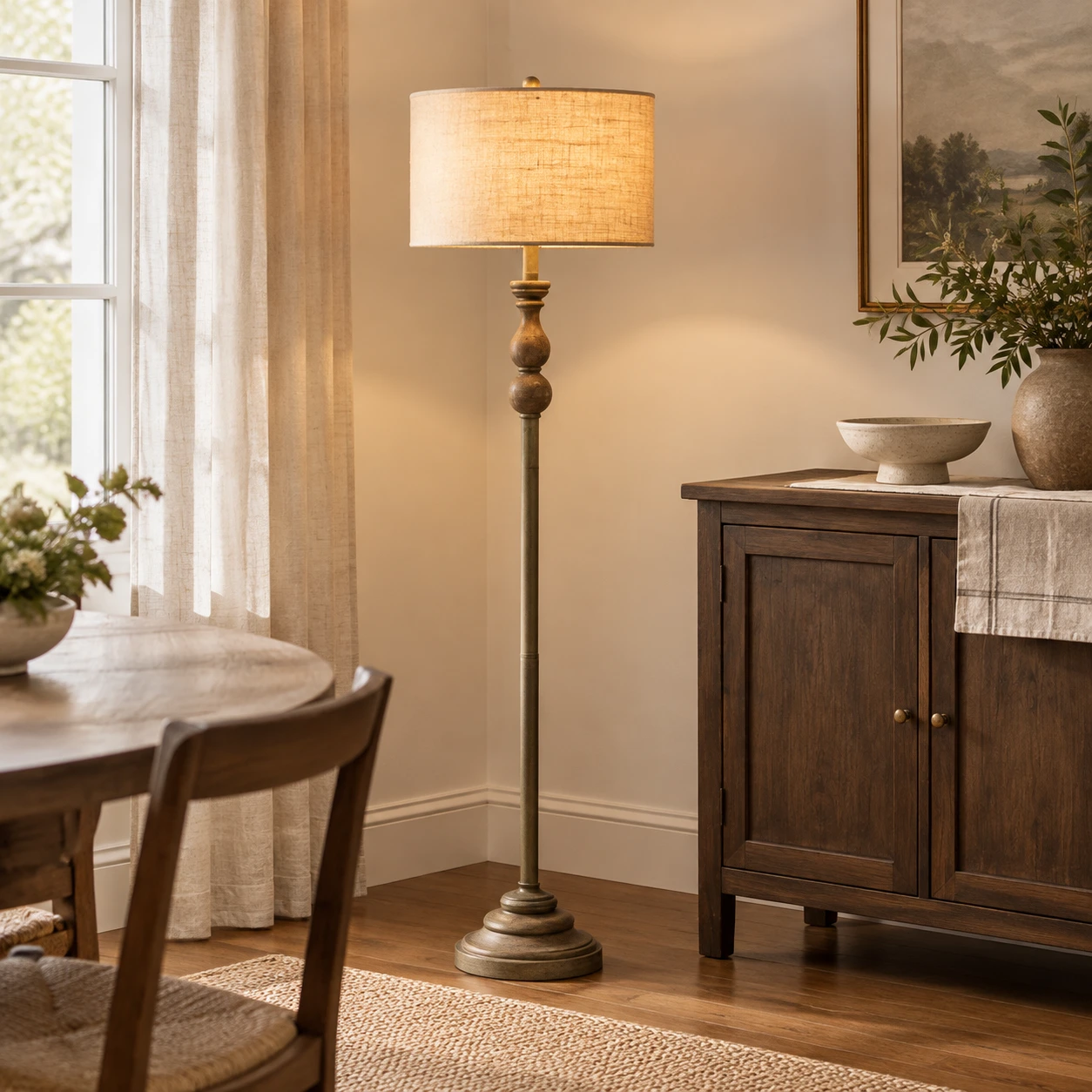 Elara Rustic Turned Wood Iron Floor Lamp — Turned wood floor lamp in a dining nook