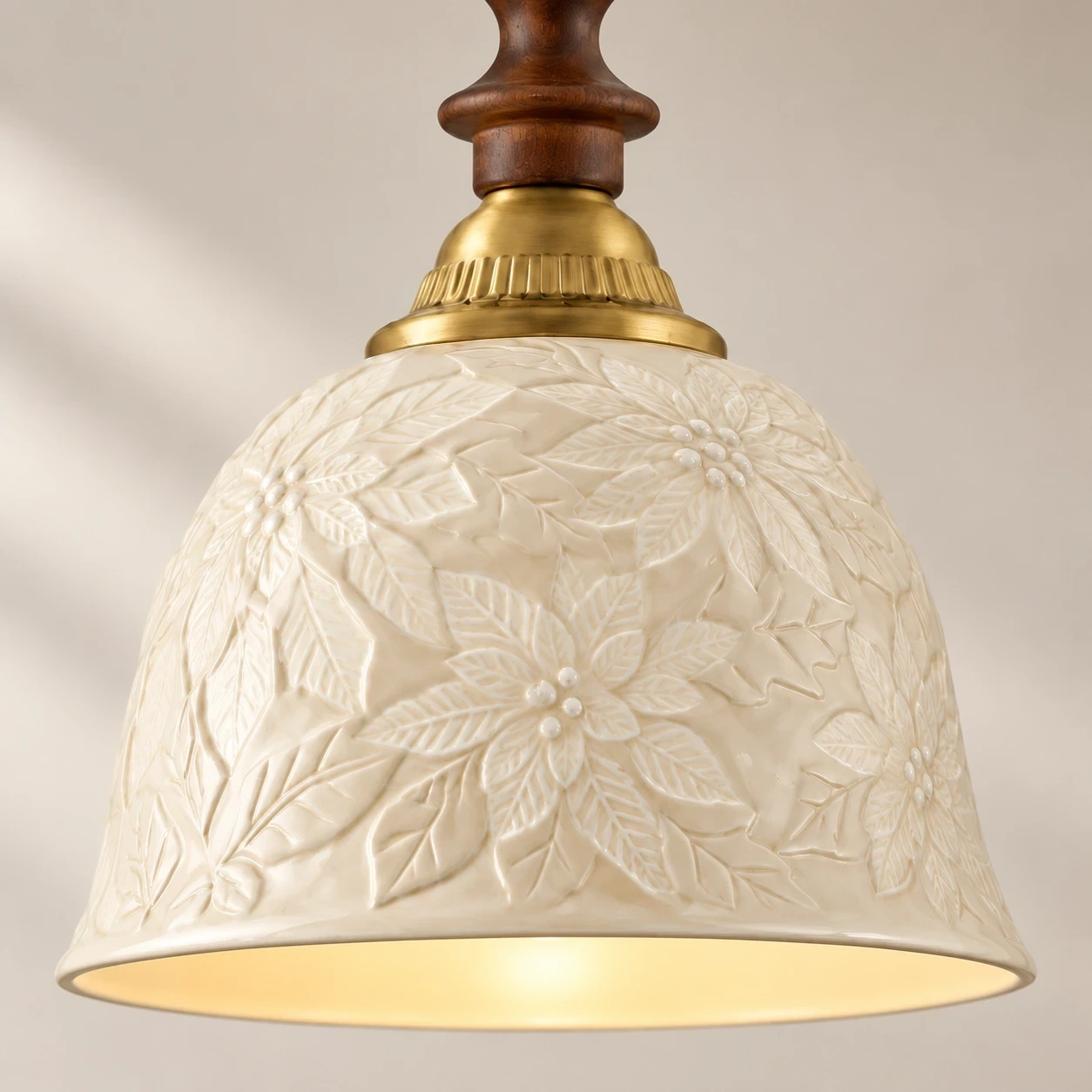 Close view of the raised ceramic relief and warm lower diffuser